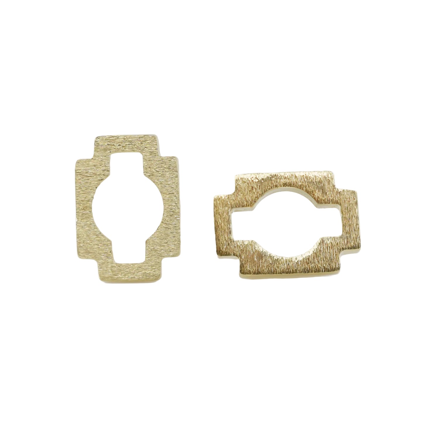 Two gold stud earrings with a brushed finish, featuring an abstract, geometric design, one in 18K yellow gold and one in 18K white gold.