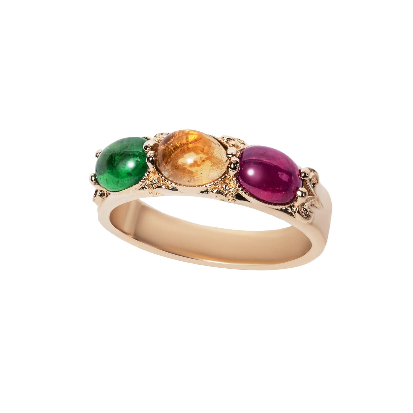 An 18K yellow gold ring with three colored gemstones: emerald, ruby, and citrine, arranged in a line with decorative gold details.